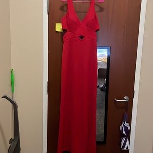 Stunning formal or prom dress! High quality, accentuates waist/chest. Never worn